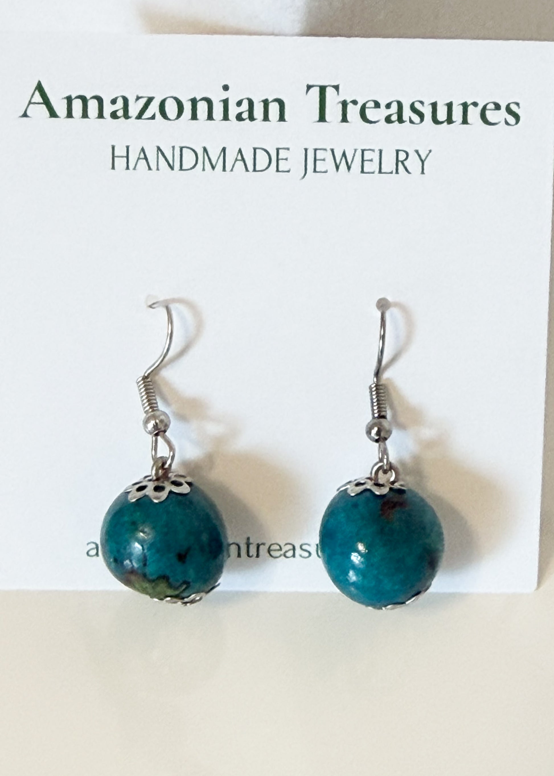 Turquoise Açaí and Paxiúba earrings handcrafted by Brazilian artisans