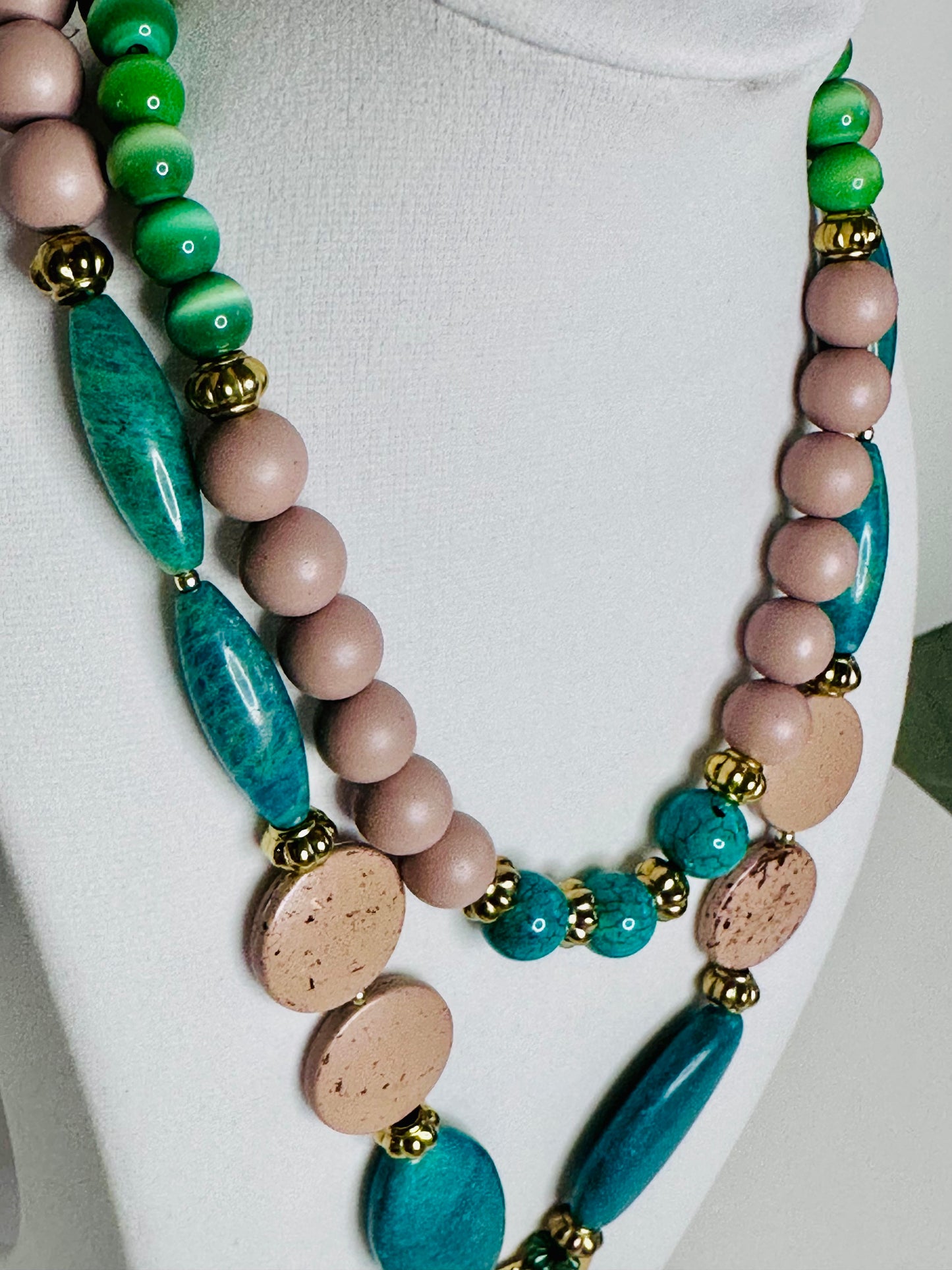 Verde Horizonte resin statement necklace featuring teal and blush amazonite-inspired pendant with double-strand bead design. detail