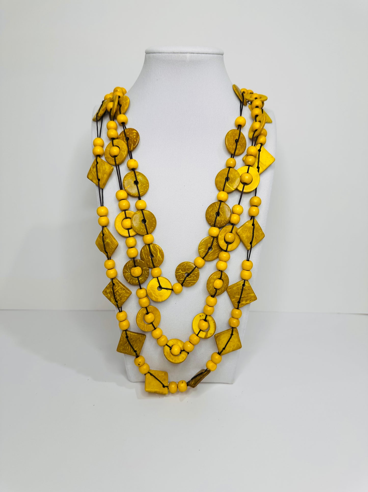 Yellow layered Amazon seed statement necklace