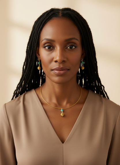 Amazonian Treasures Serra Jewel Set featuring a handwoven golden grass choker and matching earrings with stone accents.