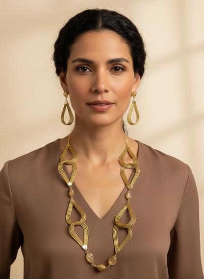 Amazonian Treasures Golden Breeze necklace and earrings set made of handwoven golden grass with citrine accents.