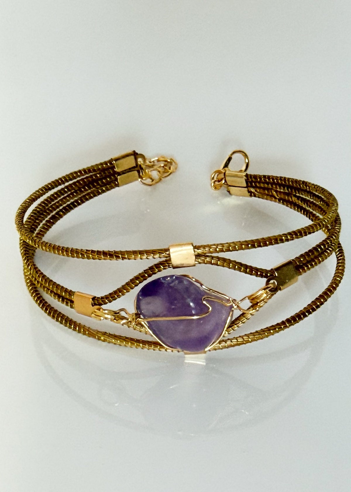 Capim dourado golden grass bracelet with amethyst-colored stone accent