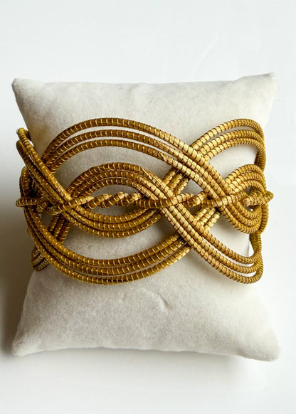 Interwoven Golden Grass statement bracelet handcrafted in Brazil