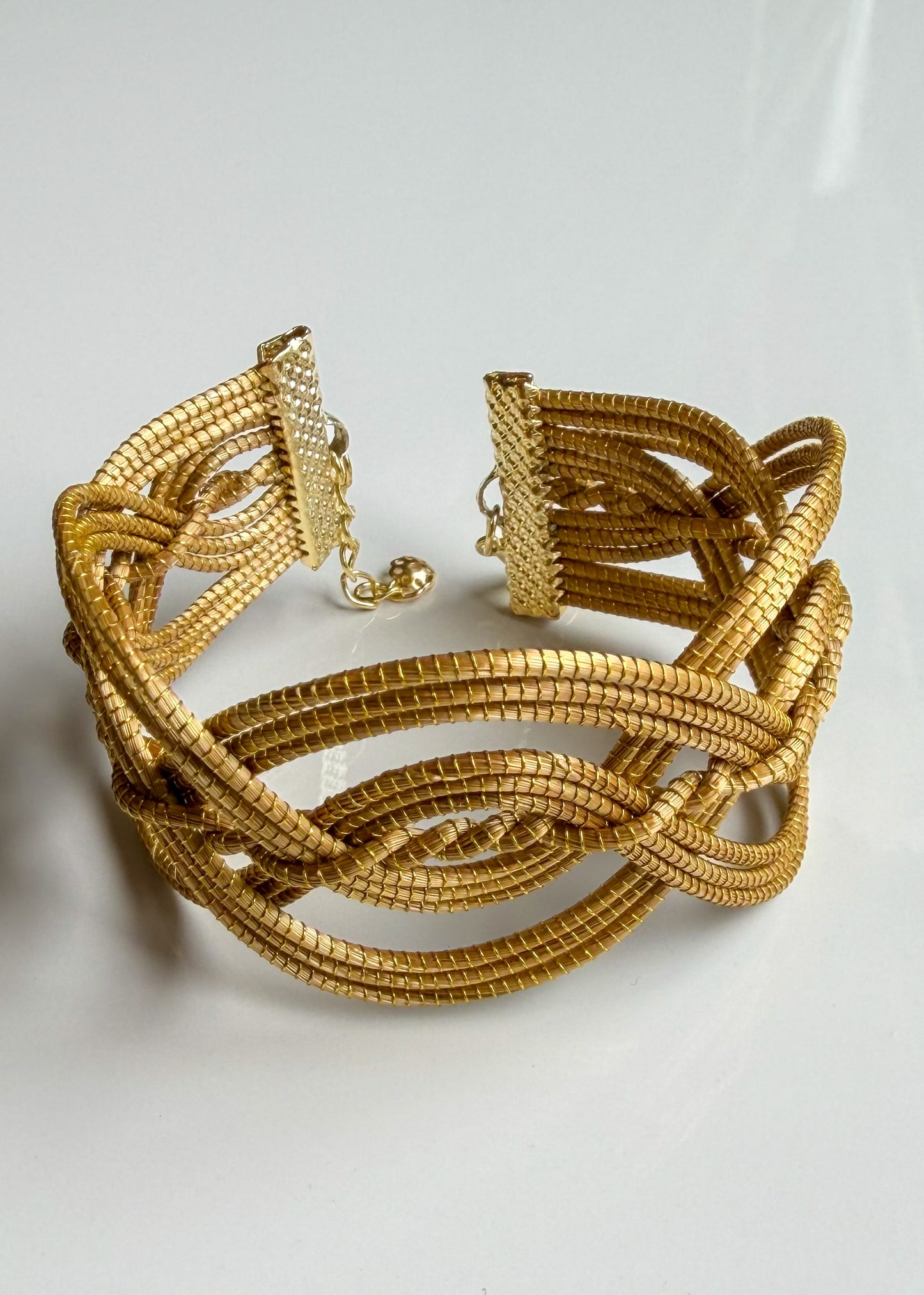 Interwoven Golden Grass statement bracelet handcrafted in Brazil detail