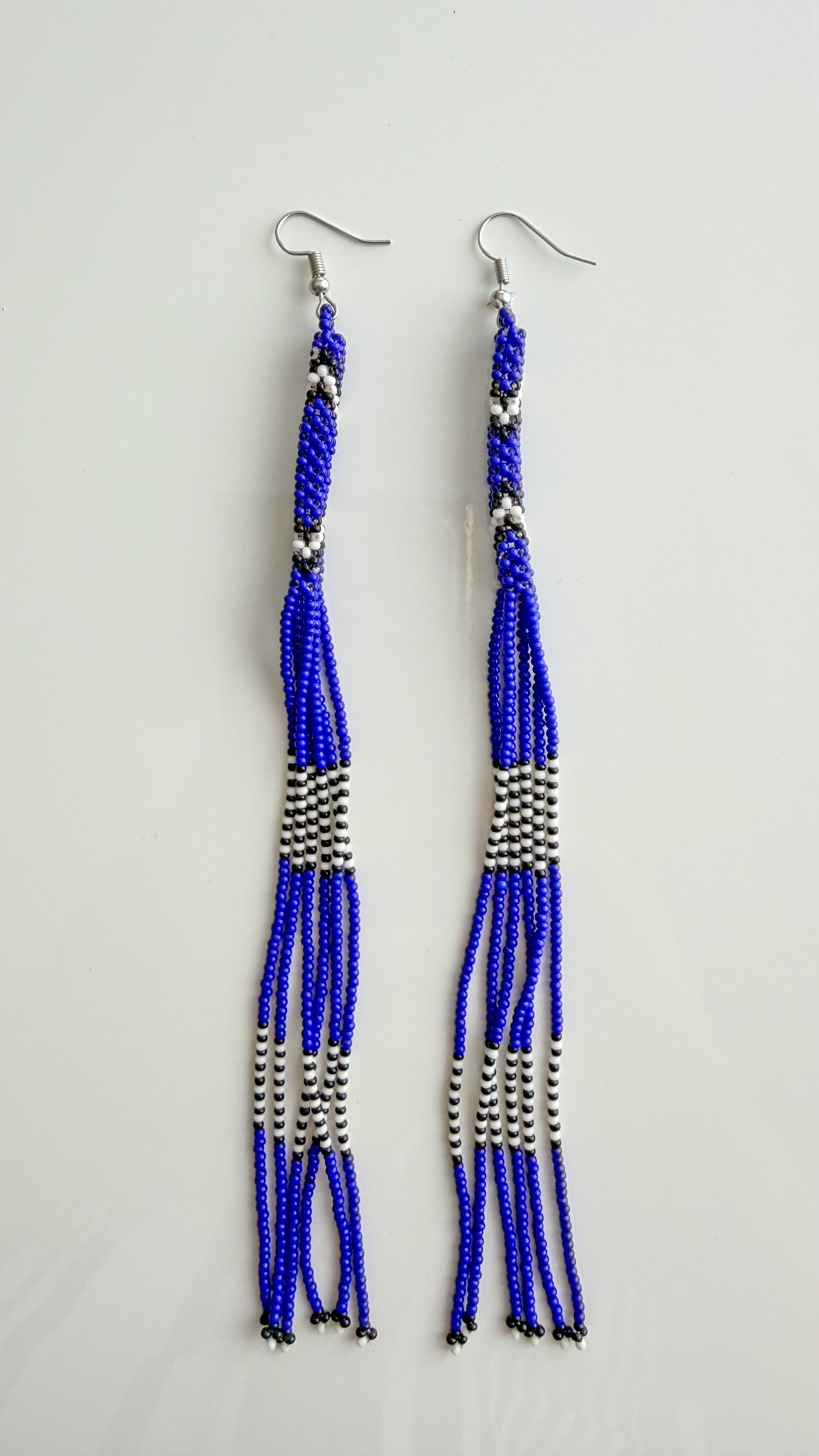 Wai Wai handmade beaded strand earrings in blue, white, and black recycled glass beads
