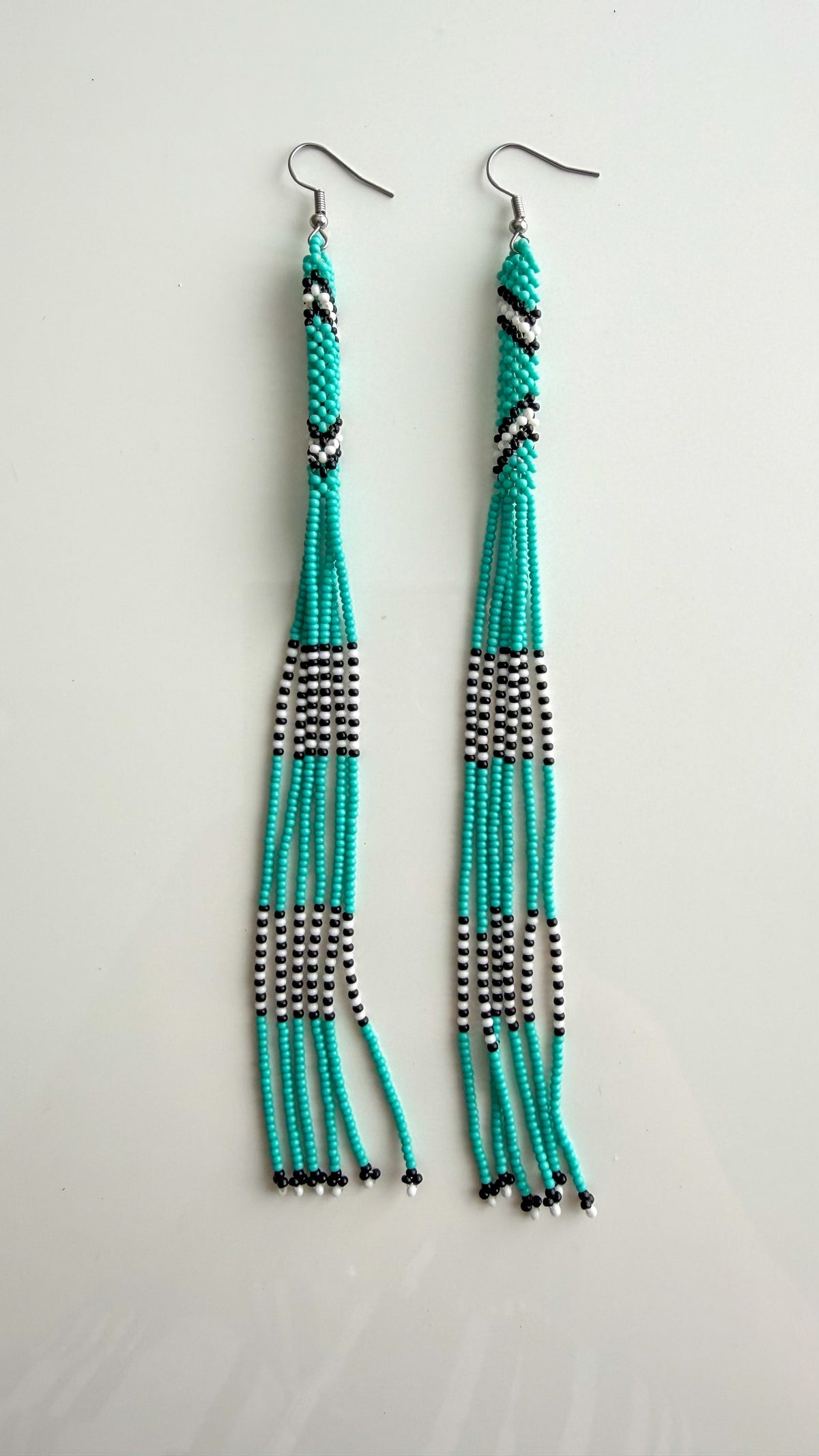 Wai Wai handmade beaded strand earrings in turquoise and black recycled glass beads