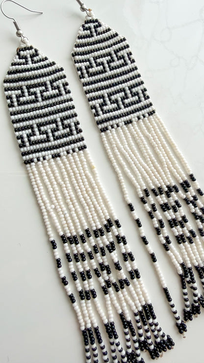 Close-up of recycled glass beadwork and fringe detail on 5.5 inch earrings