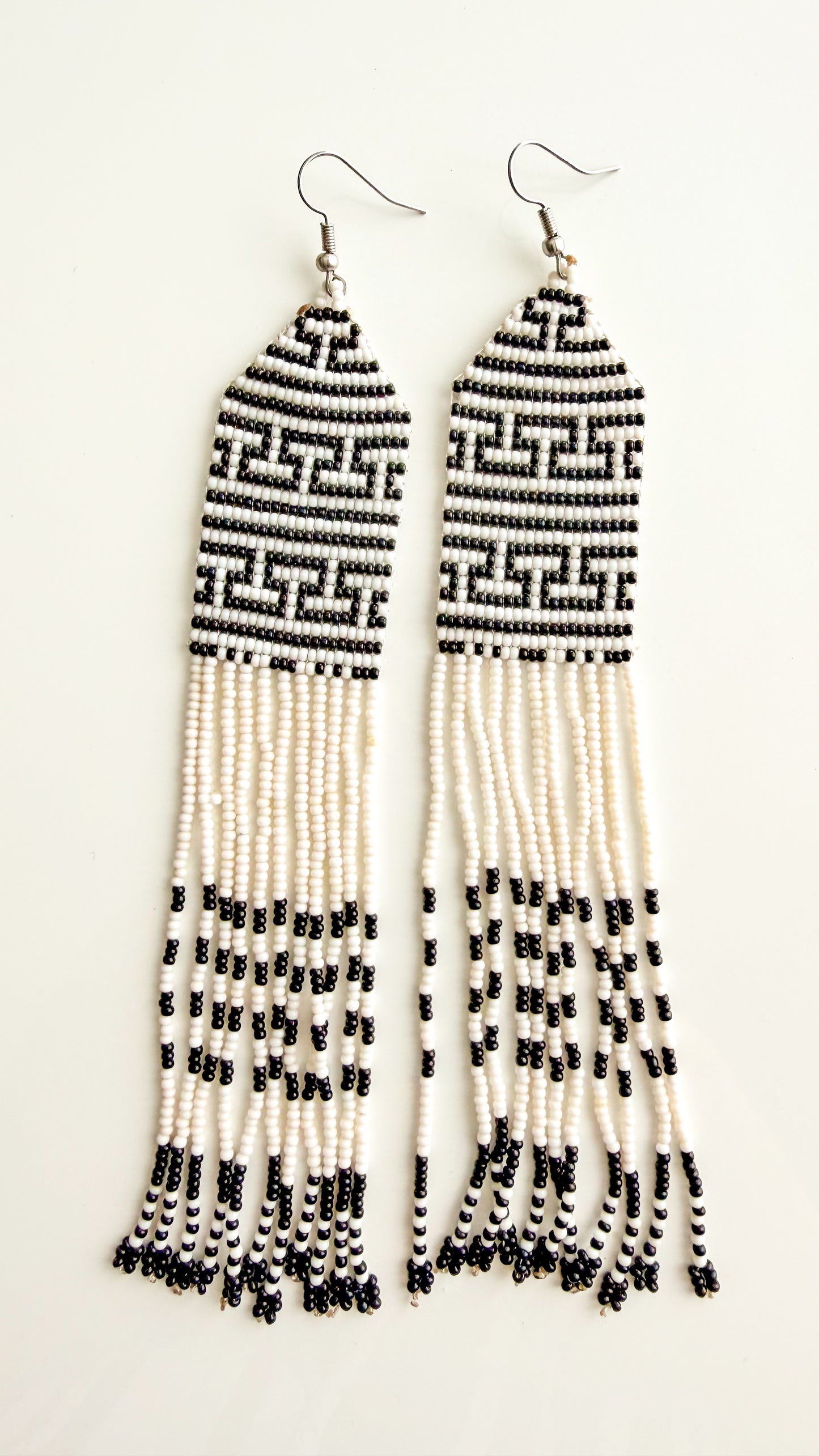 Wai Wai handmade meander fringe earrings in white and black recycled glass beads